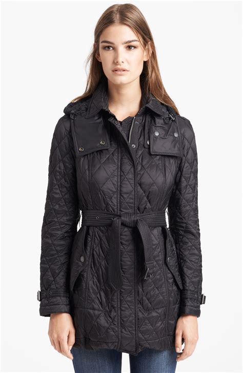 black burberry jacket with pattern on the outside|burberry finsbridge belted quilted jacket.